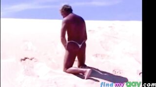 Beach Striptease: Tanned Hunk Bares All