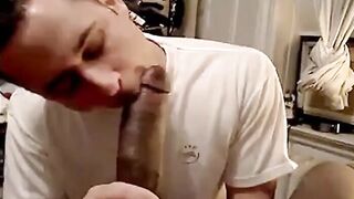 Muscular Amateur Sucks a Huge Black Cock