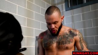 Buck on a dirty mattress inside a jail cell