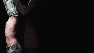 Teenage twink dominated by a huge muscular man in suit