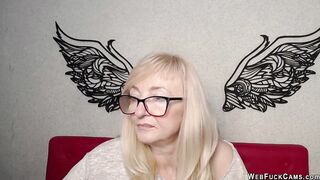 Blonde amateur MILF with glasses