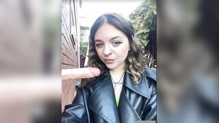 Women in leather jacket suck