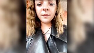 Women in leather jacket suck