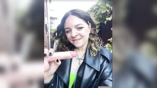 Women in leather jacket suck