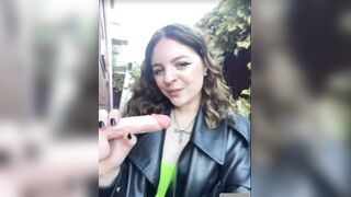 Women in leather jacket suck