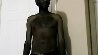 Hairy black guy jerks off his amazing cock