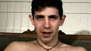 Slim twink tugs on his throbbing dick in this classic video