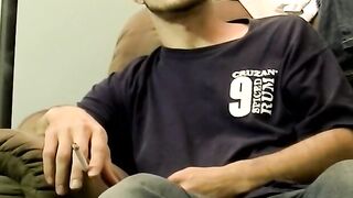 Hairy amateur gay dude smokes and strokes his cock solo