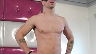 Masked athletic stud Troy does an interview before jerking