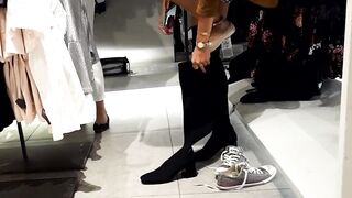 shoe shopping girlfriend tries big boots, huge legs