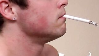 Two handsome twinks mess around the couch while smoking