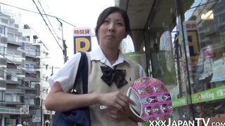 Nerdy Japanese schoolgirl with glasses teases in public