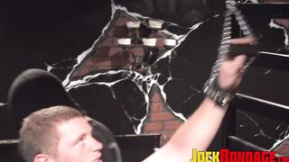 Andre Hardy explores the body of Dire Callahan and jolts him with the stun baton
