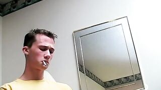 Cute chainsmoker stroke his cock as he blows smoke clouds