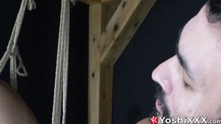 Submissive Kenji is having himself dominated and bound by a shibari master
