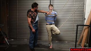 Sage Roux rubs oil all over his muscles and cock in a very sensual way