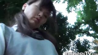 Japanese schoolgirl playing with her pussy over panties