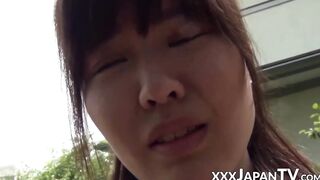 Japanese schoolgirl playing with her pussy over panties