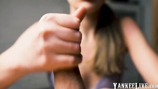 Red-lipped beauty gives an intense handjob to her man