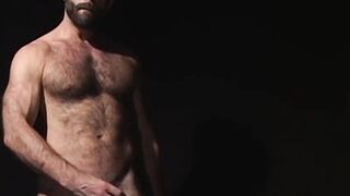Hairy daddy Ray Dragon plays with his big throbbing cock solo