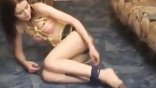 My stepsister tied in ropes and wrestling