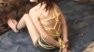My stepsister tied in ropes and wrestling