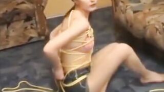 My stepsister tied in ropes and wrestling
