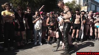 A crowd gathers to watch the brutal flogging