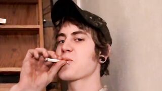 Blonde Carl plays cock while chain smokin