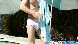 Zack Randall gives athletic Mike Roberts handjob by the pool