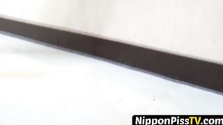 Oriental adolescent absorbs her undies and the floor with piss