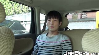 Japanese twink jerks off and cums big loads in the backseat
