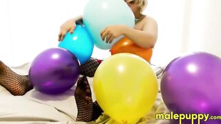 Elix Ataxx rubs the balloon over his body while rubbing dick around his playmates