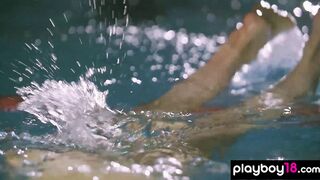 Hot swimmer posing on the starting block