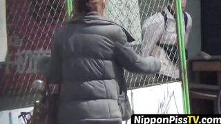 Secret cam gets Japanese chicks pissing at public latrine