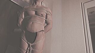 Japanese muscle hunk Kosuke is tied up by the notorious Shibari master Encho