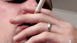 Tattooed skinny dude smoking and shooting cum on the floor