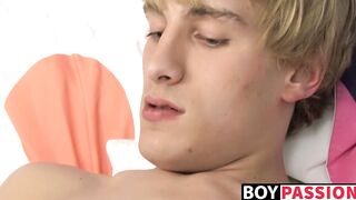 Blonde young man Dean Holland stuffing dildo and jerking off