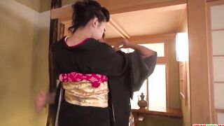 Milf takes down her kimono for a huge penis