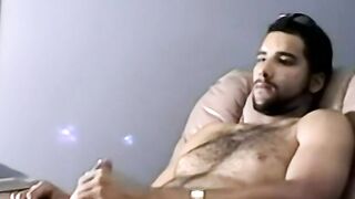 Hairy young amateur masturbates and cums solo on camera