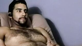 Hairy young amateur masturbates and cums solo on camera