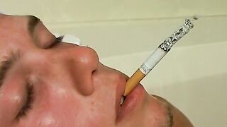 Gorgeous Christian Taylor stroking and smoking in the tub