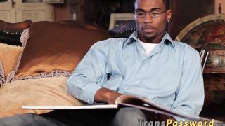 Skinny black guy dicks a stunning shemale hooker from behind