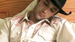 Hottie Cody lights his red cig while stroking his pinkish cock