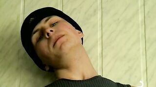 Smoking Twink caresses his cock in an exciting manner