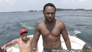 Dallas Knight and Thugzilla show off their mighty fine bods while driving on a boat