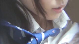 Japanese schoolgirl playing with her juicy pussy