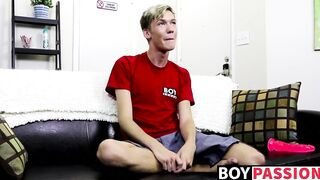Twink laying alone and stroking cock before using toy