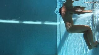 Chubby Hottie Puzan Bruhova swims nude inside the pool