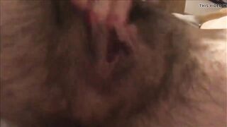 Unshaved MILF having fun with her turned on pussy